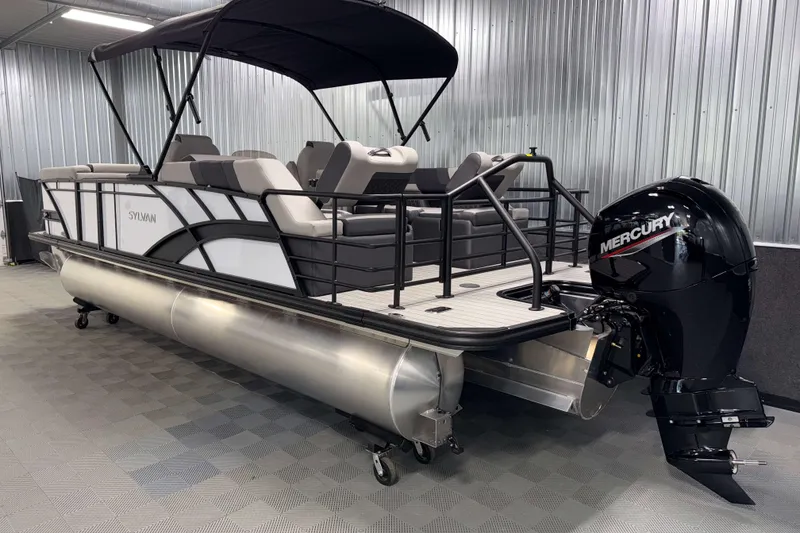 Slide: The Image of 2026 Sylvan L3 LZ pontoon boat with Mercury outboard motor in showroom. - 27