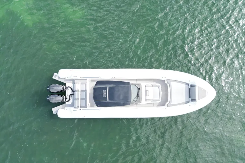 Slide: The Image of Aerial view of 2026 Northstar ORION 10 boat on green water. - 6