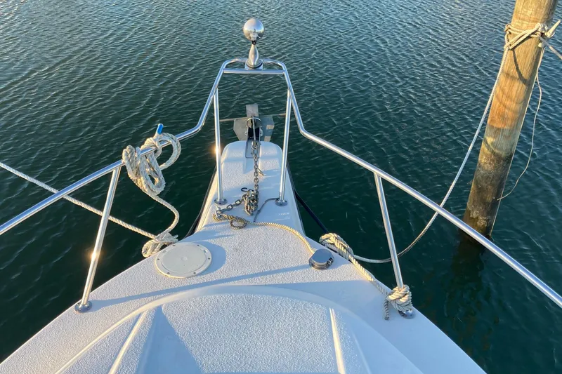 Slide: The Image of Bow view of 1999 Chaparral Signature 29 boat with anchor and ropes. - 44