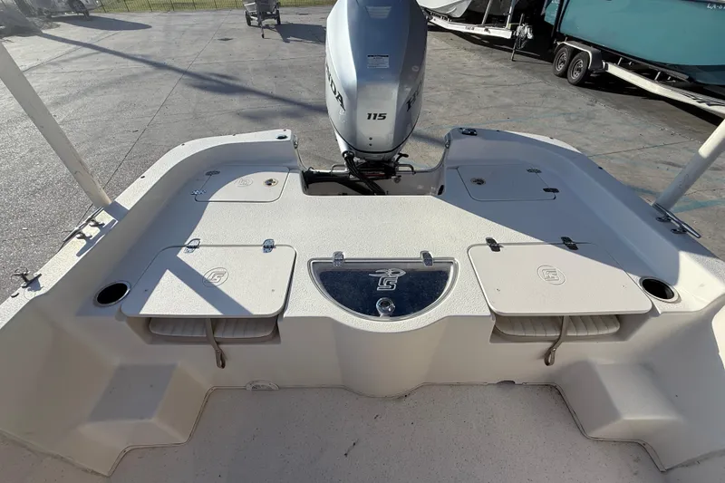 Slide: The Image of 2017 Carolina Skiff 218 boat deck with Honda 115 outboard motor. - 14