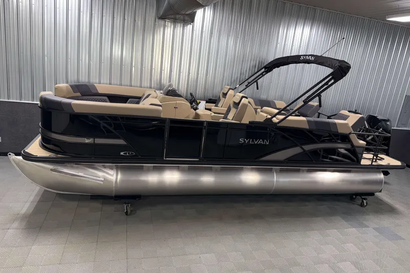The Image of 2026 Sylvan L3 LZ pontoon boat in showroom, featuring sleek design and comfortable seating. - 0