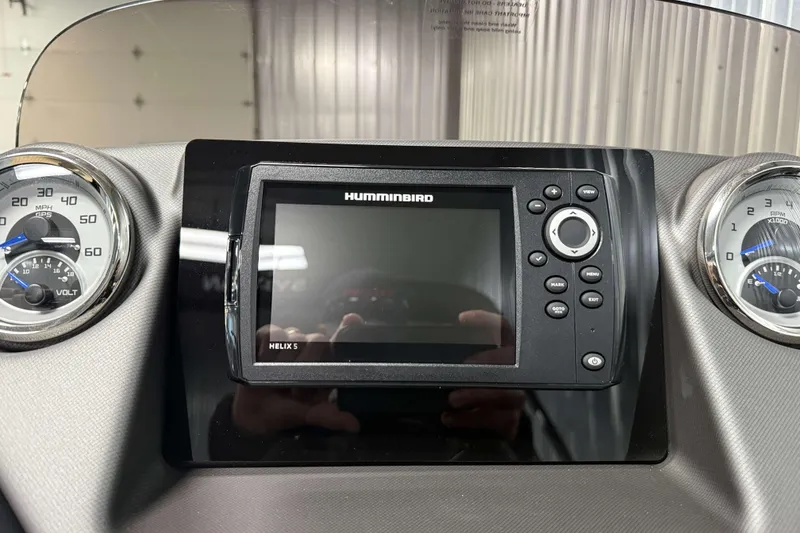 Slide: The Image of Dashboard of 2026 Sylvan L3 LZ with Humminbird Helix 5 and gauges. - 11