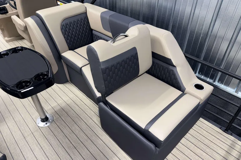 Slide: The Image of Luxurious seating on 2026 Sylvan L3 LZ boat with modern design and cup holders. - 14