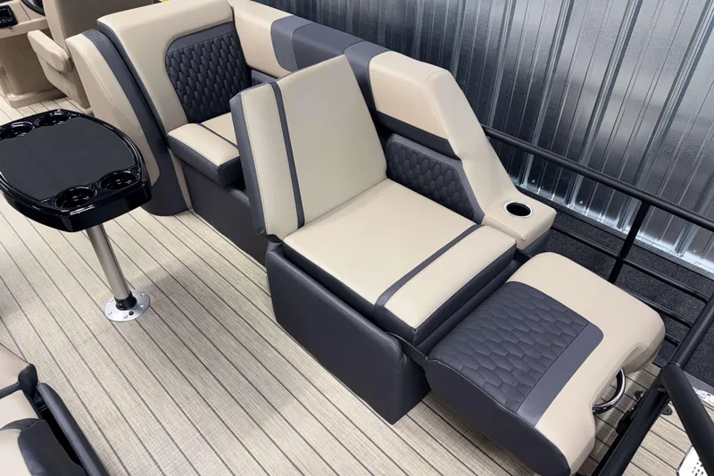 Slide: The Image of Luxurious seating in 2026 Sylvan L3 LZ boat with modern design and cup holders. - 15