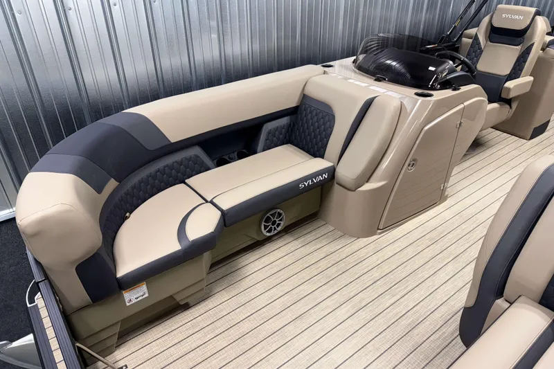 Slide: The Image of Luxurious interior of 2026 Sylvan L3 LZ pontoon boat with plush seating. - 2