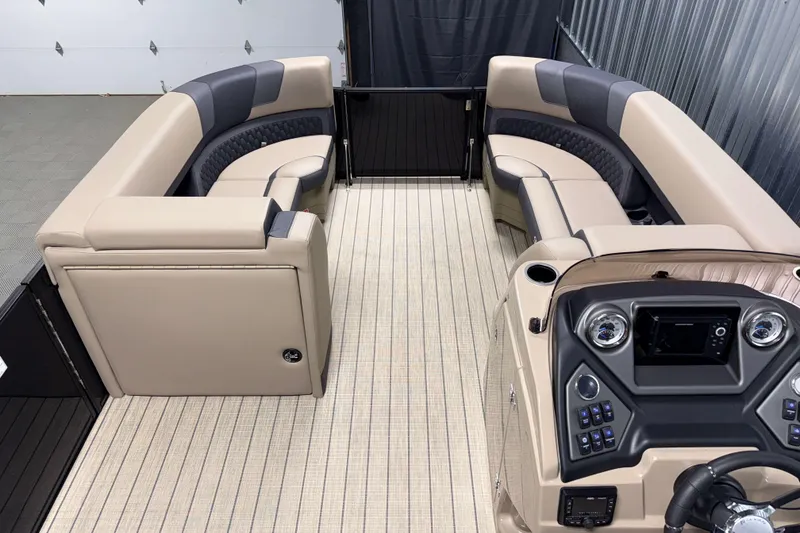Slide: The Image of Luxurious interior of 2026 Sylvan L3 LZ pontoon boat with plush seating and modern dashboard. - 5