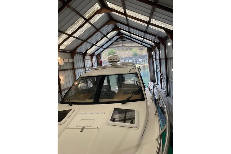 Slide: The Image of Interior of 2016 Cutwater C-24 boat with steering wheel and control panel. - 11