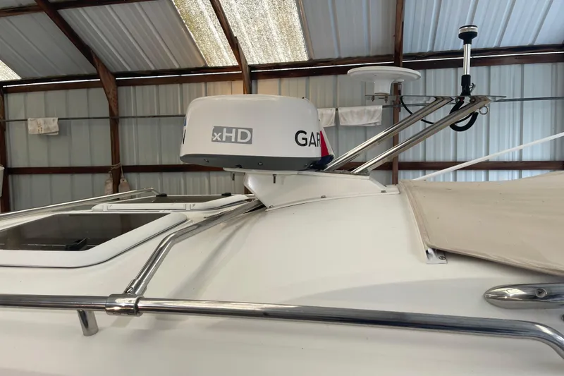 Slide: The Image of JBL audio control panel on 2016 Cutwater C-24 boat dashboard. - 14