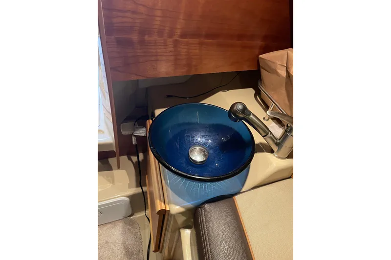 Slide: The Image of Engine compartment of a 2016 Cutwater C-24 boat with Volvo Penta components. - 21