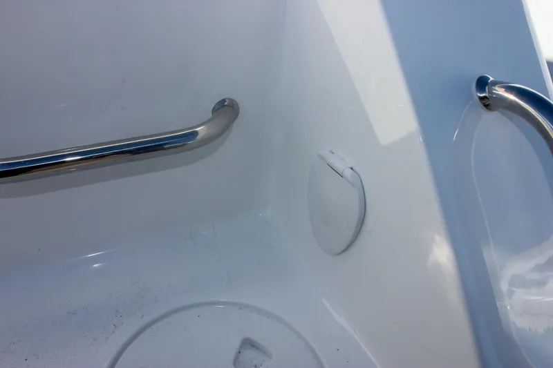 Slide: The Image of Interior detail of 2026 Sea Hunt Ultra 285 SE boat with stainless steel handrails. - 11