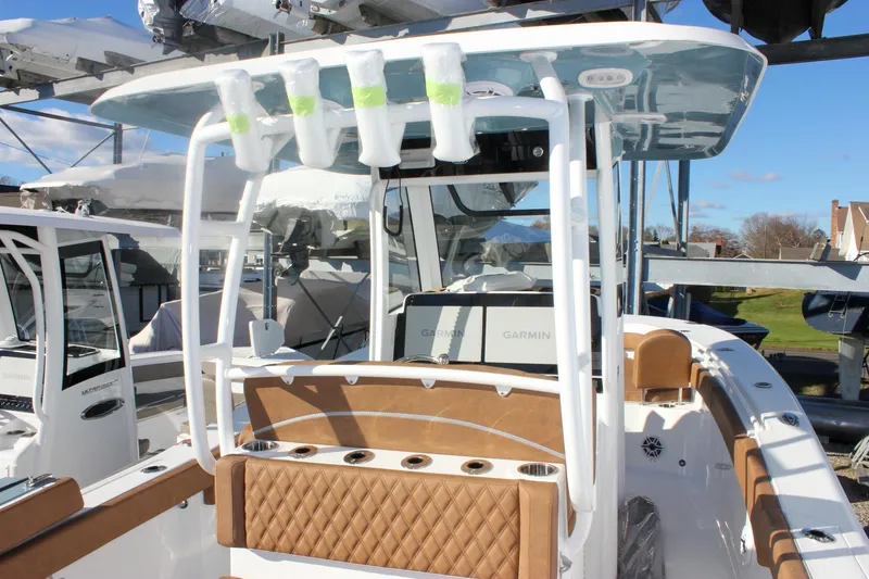 Slide: The Image of 2026 Sea Hunt Ultra 285 SE boat interior with modern seating and equipment. - 15