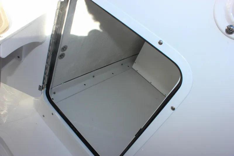 Slide: The Image of Storage compartment on 2026 Sea Hunt Ultra 285 SE boat. - 28