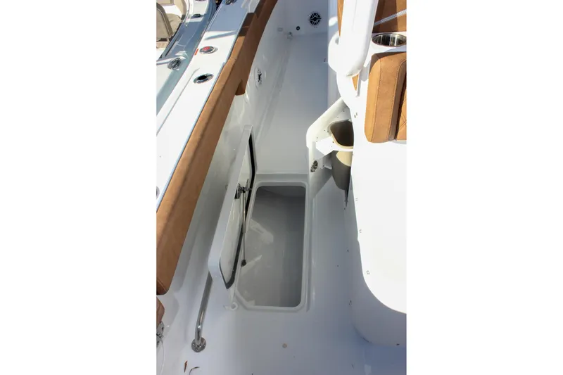 Slide: The Image of Interior view of 2026 Sea Hunt Ultra 285 SE boat, featuring storage compartment. - 30
