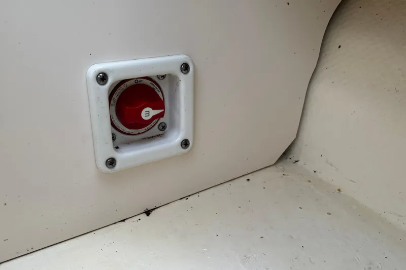 Slide: The Image of Battery switch on 2016 Chaparral 210 Suncoast Ski & Fish boat interior. - 28