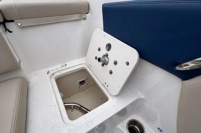 Slide: The Image of 2016 Chaparral 210 Suncoast Ski & Fish boat interior with storage compartment. - 29