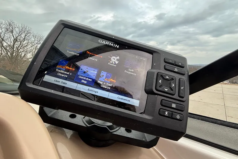 Slide: The Image of Garmin navigation system on 2016 Chaparral 210 Suncoast Ski & Fish boat dashboard. - 30