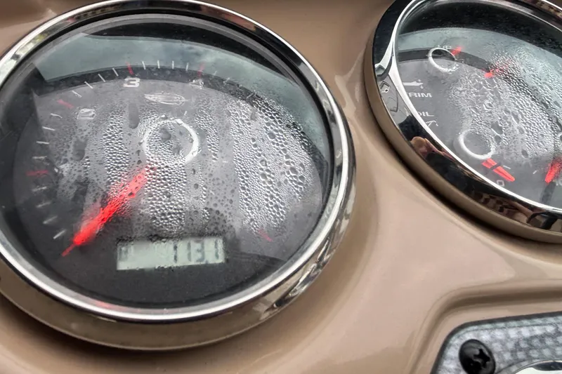 Slide: The Image of Close-up of fogged gauges on a 2016 Chaparral 210 Suncoast Ski & Fish boat. - 33