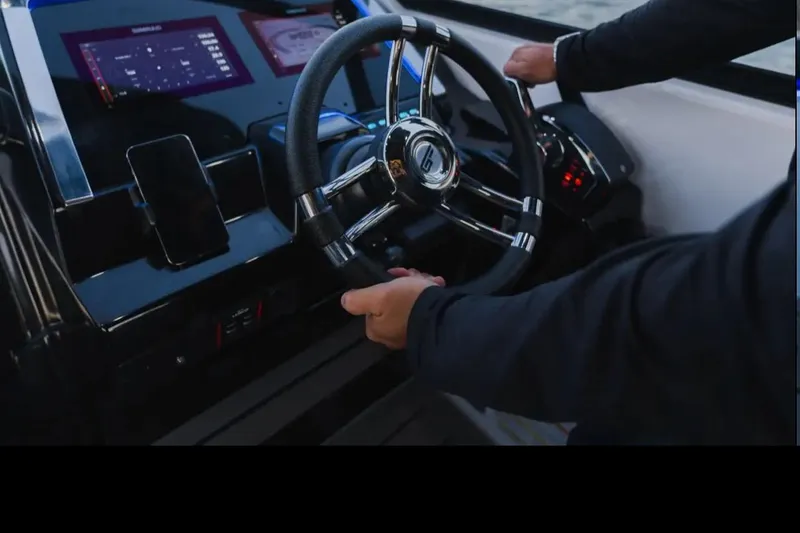 Slide: The Image of Interior cabin of 2026 Granfort 300 GTS, featuring cozy bedding and ambient lighting. - 13