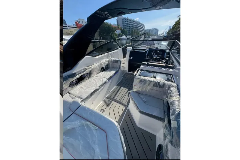 Slide: The Image of 2026 Granfort 300 GTS boat cockpit with modern steering and control panel. - 7