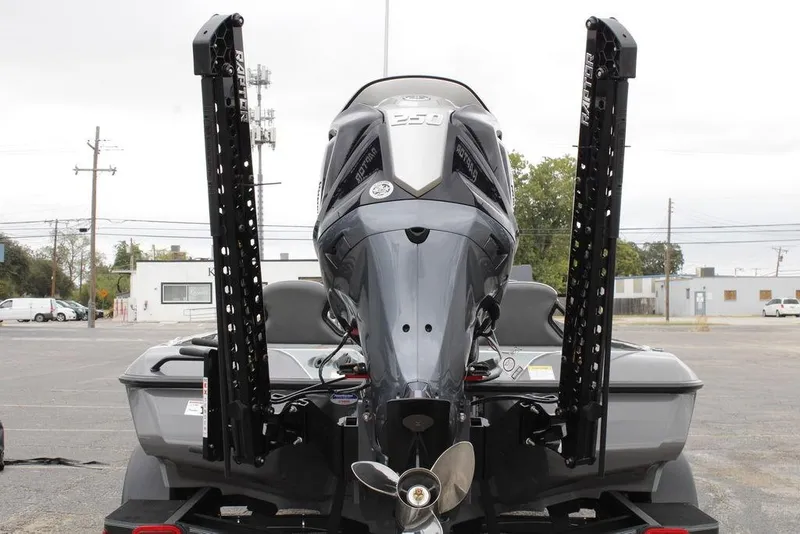 Slide: The Image of 2026 Skeeter ZXE20 boat rear view with powerful outboard motor. - 9
