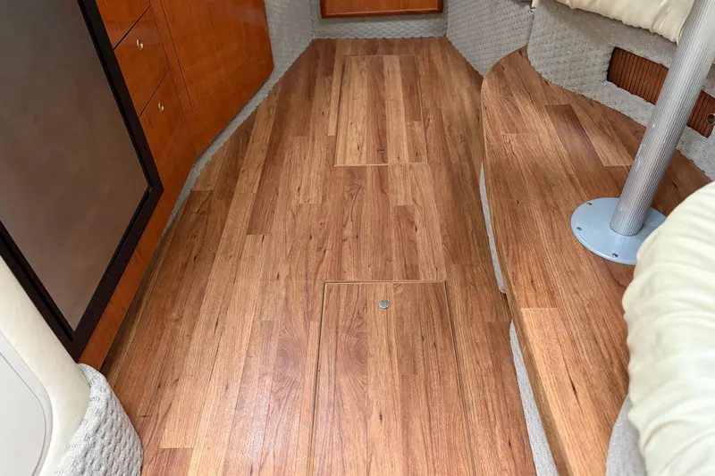 Slide: The Image of Interior of 2001 Sea Ray 340 Sundancer yacht kitchen with wood cabinetry and appliances. - 10