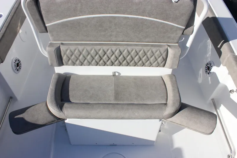 Slide: The Image of Gray seating on 2026 Sea Hunt Ultra 265 SE boat, featuring diamond-patterned upholstery. - 10