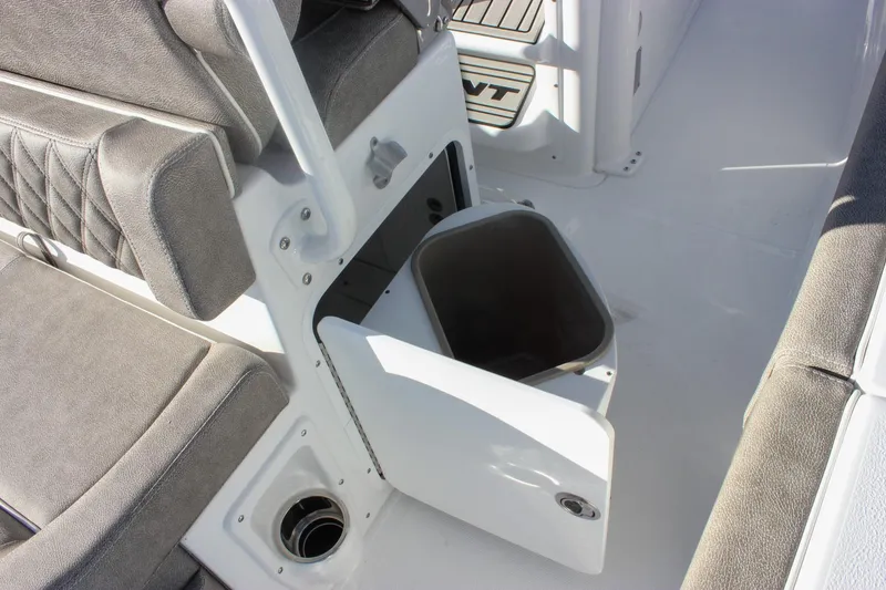 Slide: The Image of 2026 Sea Hunt Ultra 265 SE boat interior with open storage compartment. - 13