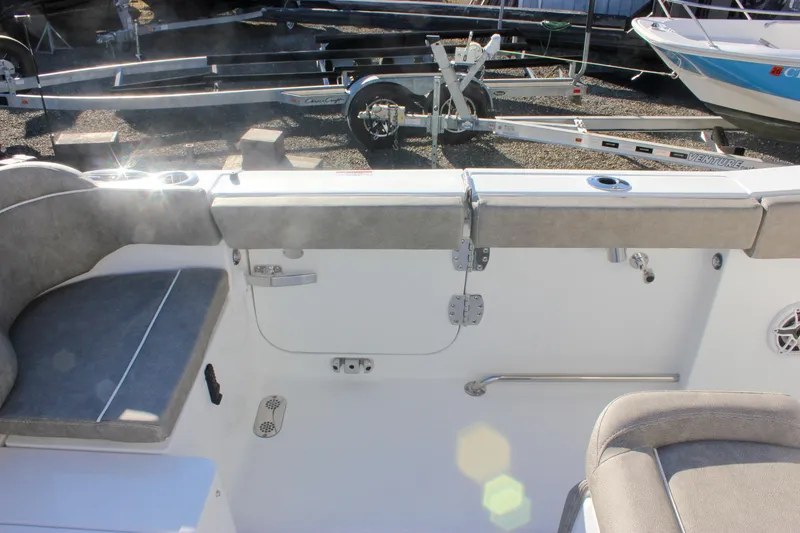 Slide: The Image of Interior view of 2026 Sea Hunt Ultra 265 SE boat, featuring seating and storage. - 17