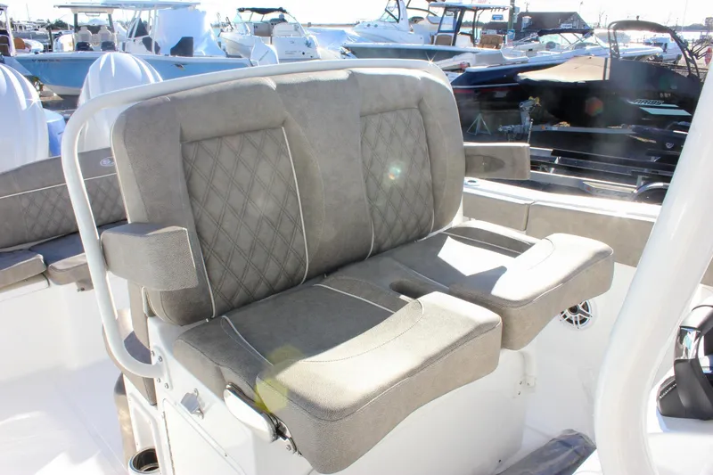 Slide: The Image of 2026 Sea Hunt Ultra 265 SE boat seating with diamond-stitched upholstery. - 24