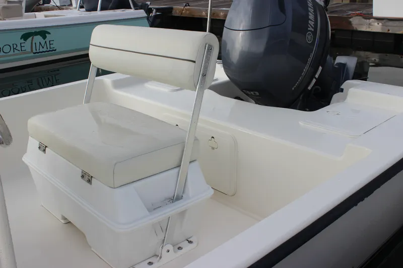 Slide: The Image of 2014 Key West 177 Skiff boat interior with Yamaha outboard motor. - 17