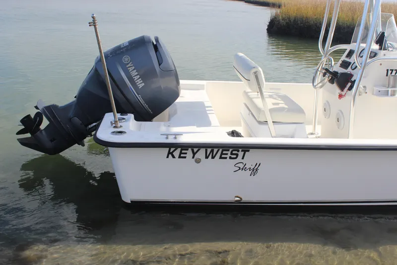 Slide: The Image of 2014 Key West 177 Skiff boat with Yamaha outboard motor in shallow water. - 4