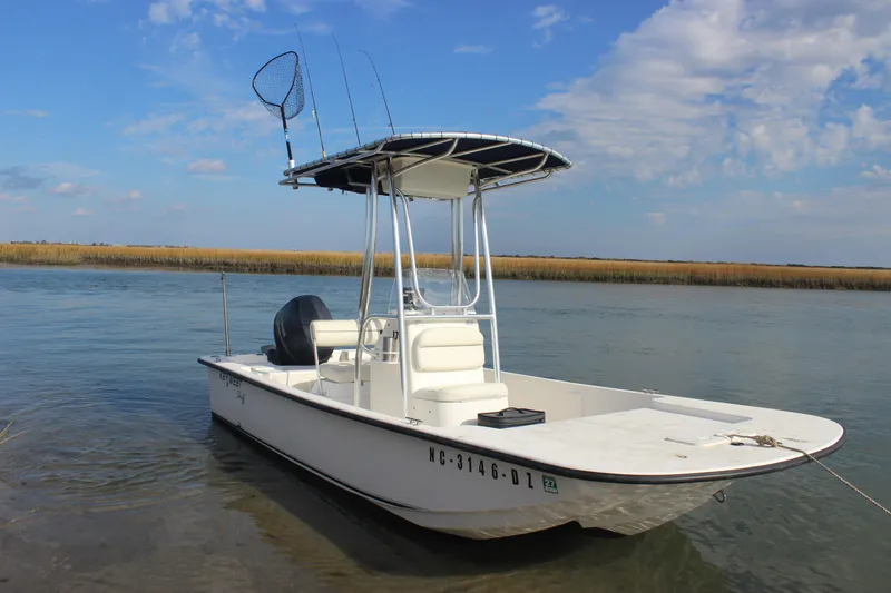 Slide: The Image of 2014 Key West 177 Skiff boat on calm water with fishing gear. - 7