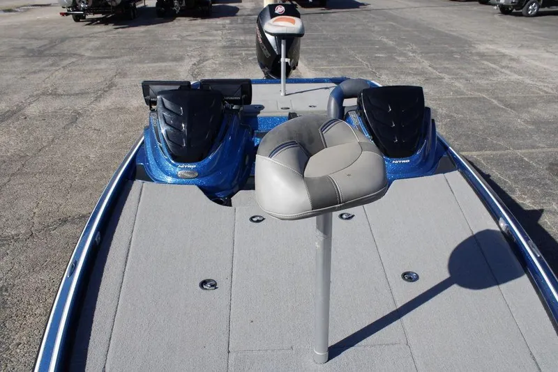 Slide: The Image of 2019 Nitro Z20 boat with dual engines and a central seat on deck. - 12
