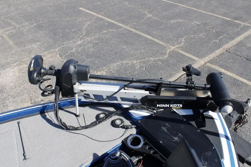 Slide: The Image of Minn Kota Ultrex trolling motor on 2019 Nitro Z20 boat, parked on asphalt. - 13