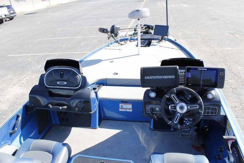 Slide: The Image of 2019 Nitro Z20 boat interior with steering wheel, Humminbird electronics, and seating. - 14