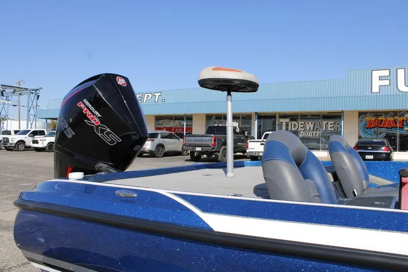 Slide: The Image of 2019 Nitro Z20 boat with Mercury Pro XS engine, parked outside a dealership. - 25