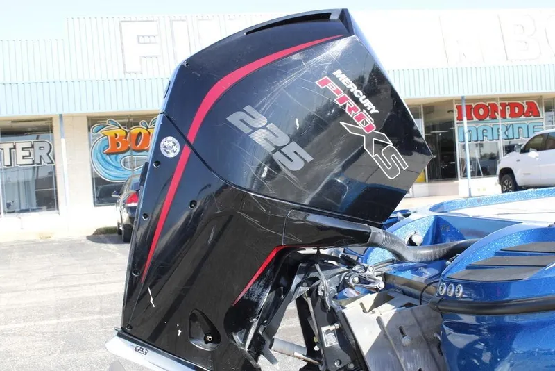 Slide: The Image of 2019 Nitro Z20 boat with Mercury Pro XS 225 engine in a dealership lot. - 3