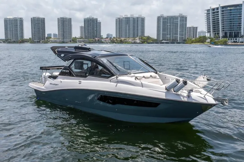 The Image of 2026 Granfort 37 GTX luxury yacht on water with city skyline backdrop. - 0