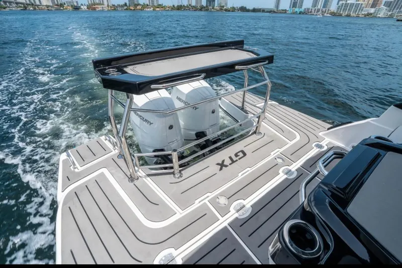 Slide: The Image of Luxurious 2026 Granfort 37 GTX yacht interior with modern seating and sleek design. - 12