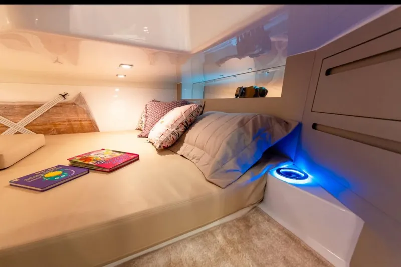 Slide: The Image of 2026 Granfort 37 GTX luxury yacht interior with grill and scenic waterfront view. - 16