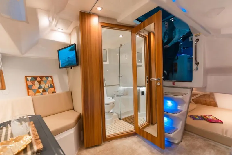 Slide: The Image of Interior of 2026 Granfort 37 GTX boat with modern audio system and sleek design. - 19