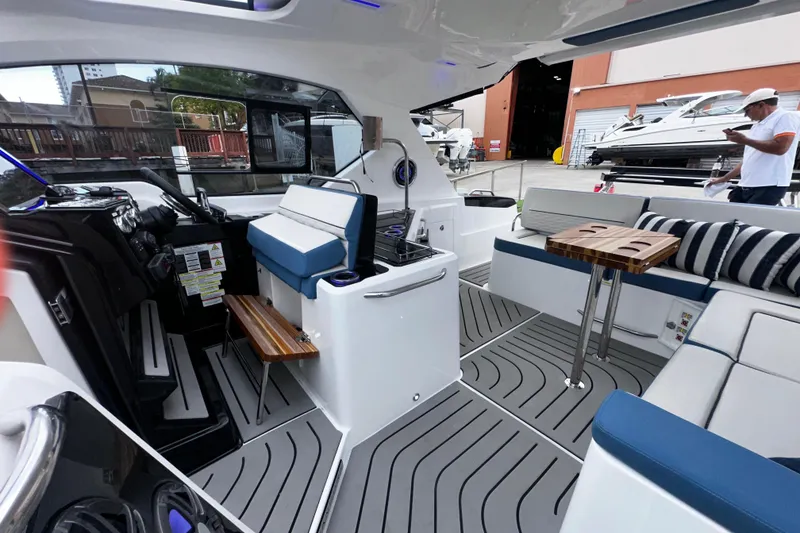 Slide: The Image of Interior of 2026 Granfort 37 GTX yacht with cozy seating and wall-mounted TV. - 26