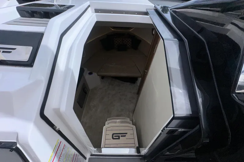 Slide: The Image of Granfort 37 GTX 2026 boat with dual Mercury engines at a dock. - 38