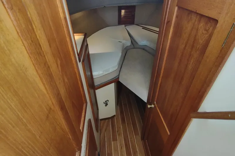 Slide: The Image of Electrical control panel on a 1990 Nordic Tug 32 boat, featuring gauges and switches. - 44