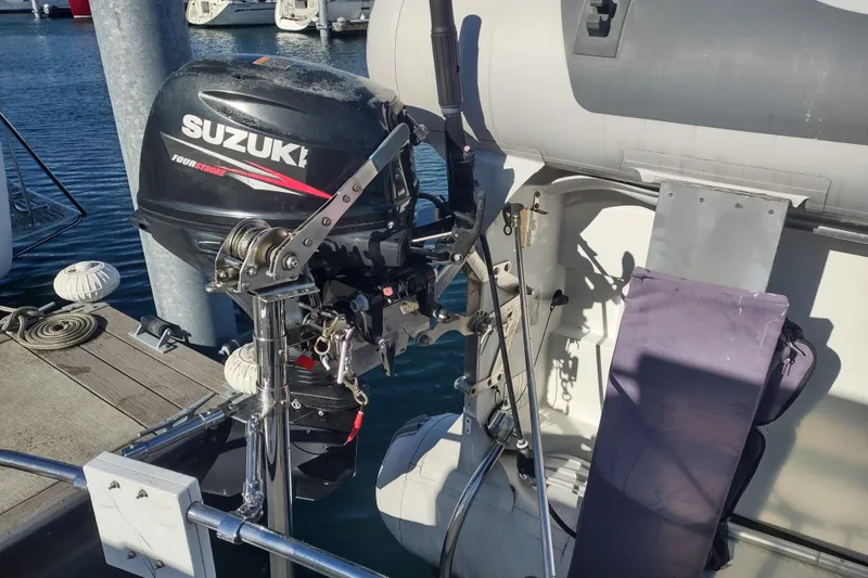 Slide: The Image of Engine compartment of a 1990 Nordic Tug 32, showcasing detailed mechanical components. - 59