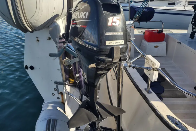 Slide: The Image of Engine compartment of a 1990 Nordic Tug 32, showcasing detailed mechanical components. - 60