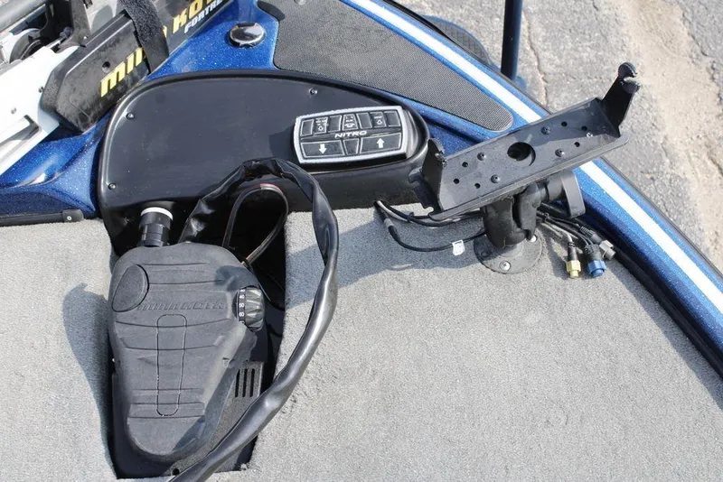 Slide: The Image of Control panel of a 2015 Nitro Z-9 boat with Minn Kota foot pedal. - 10