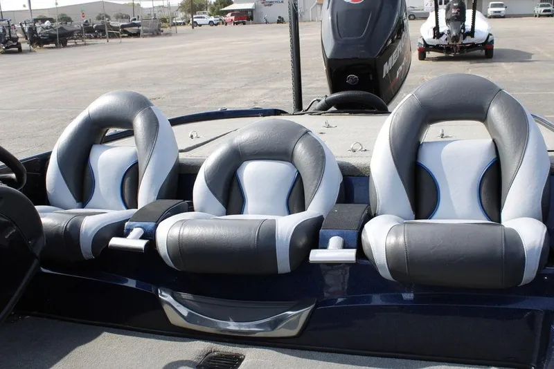 Slide: The Image of 2015 Nitro Z-9 boat interior with three gray and white cushioned seats. - 16