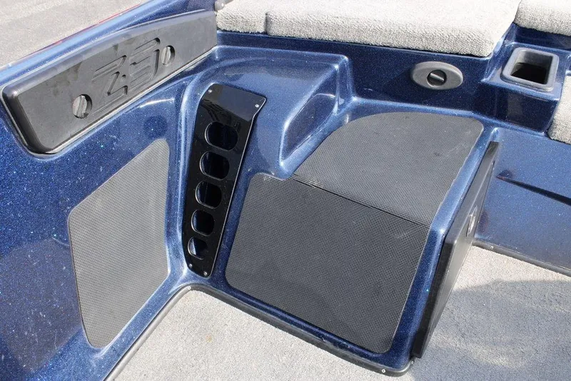 Slide: The Image of 2015 Nitro Z-9 boat interior with blue finish and seating area. - 18