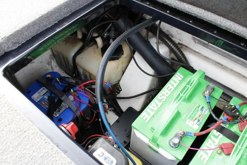 Slide: The Image of 2015 Nitro Z-9 boat battery compartment with Interstate and Optima batteries. - 28